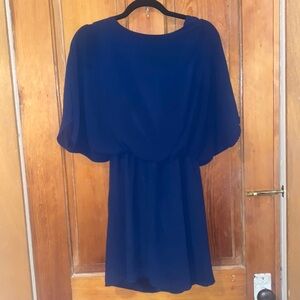 STUNNING SIMPLE BLUE DRESS WITH SURPRISE CUT OUT BACK